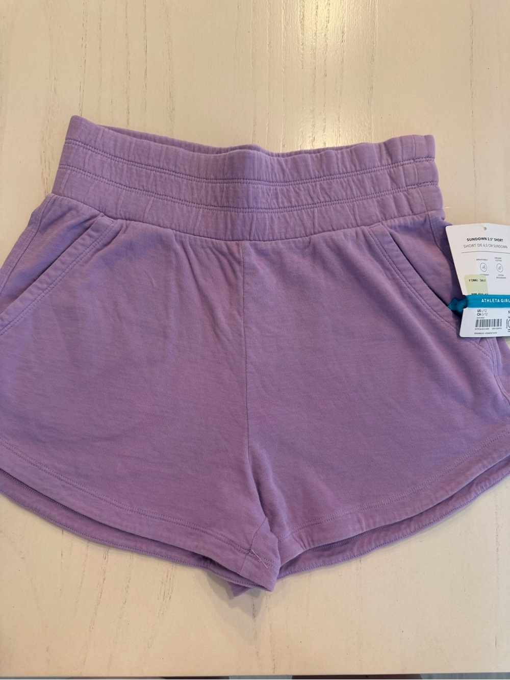 Athleta Girls purple shorts Age 12 NWT